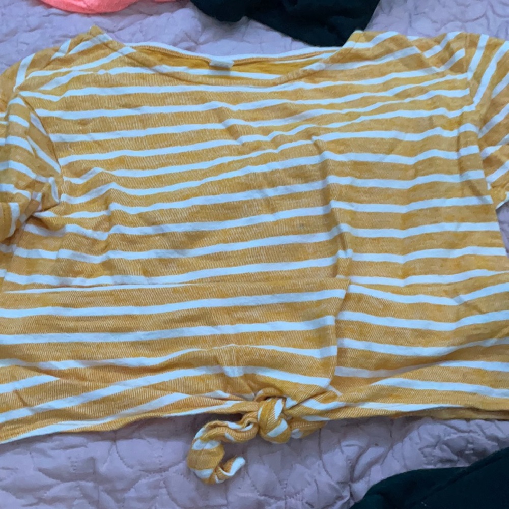 A yellow shirt with stripes